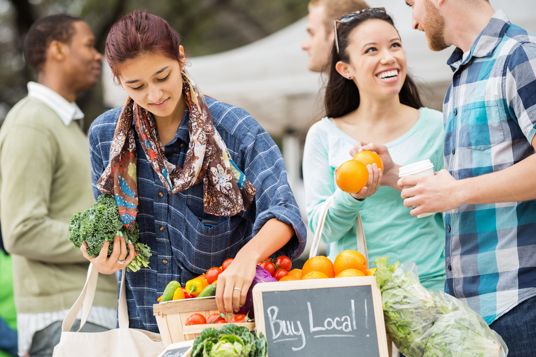 Couple shopping at local farmers market